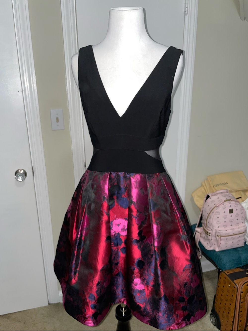 Avery G Black & Floral Fit-and-Flare Dress. Sheer cut outs